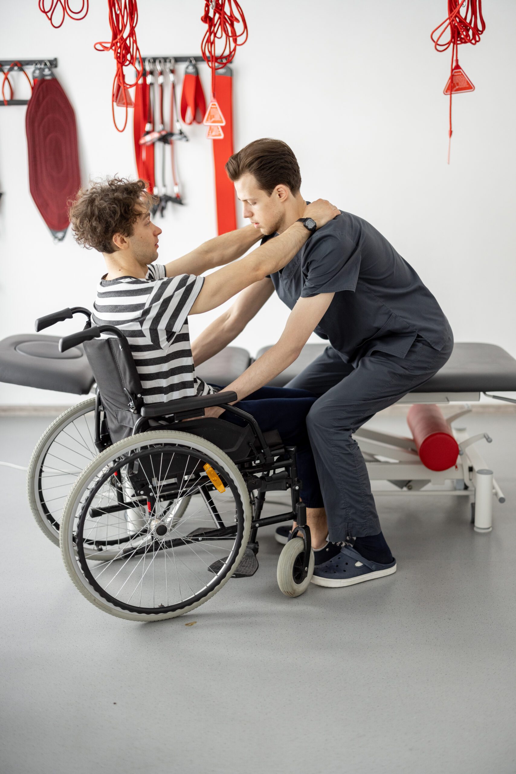 rehabilitation specialist helps man to get up from 2022 02 14 21 30 08 utc scaled