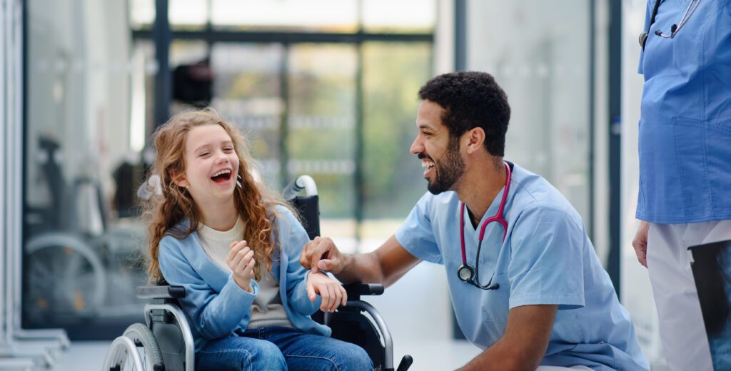 young multiracial doctor having fun with little gi 2022 12 07 00 25 51 utc 1